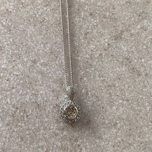 18 inch 14 karat gold necklace with white and chocolate diamond pendant